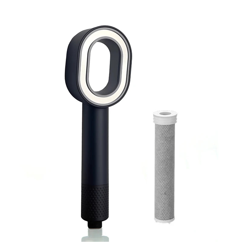 Black shower head with cylindrical filter on a white background