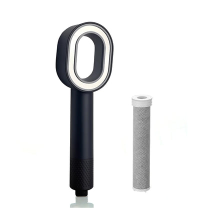 Black shower head with cylindrical filter on a white background