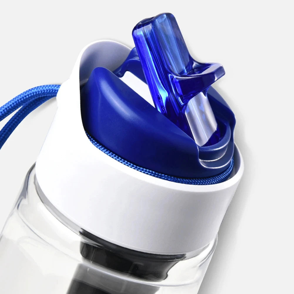 Close up of the blue and white cap of a Premium Filter Water Bottle against a white background.