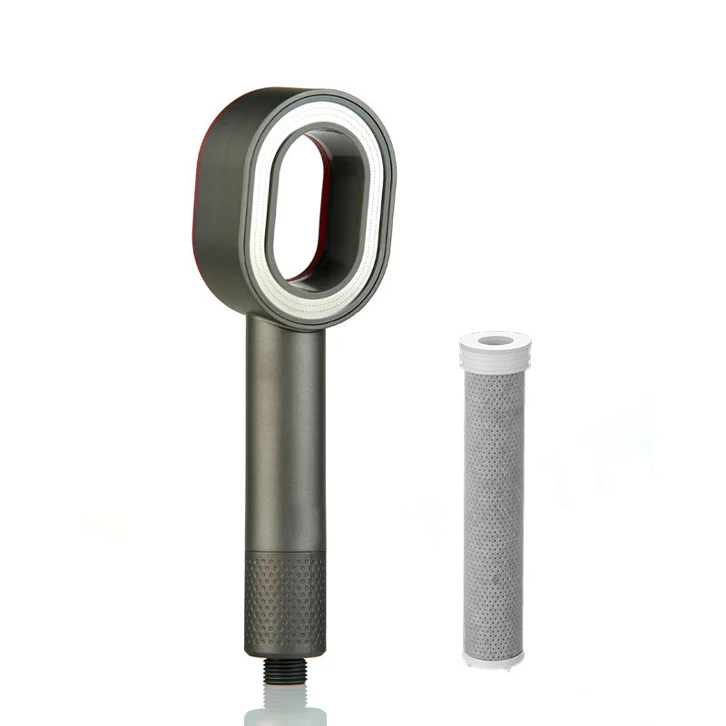 Silver shower head with filter cartridge on a white background